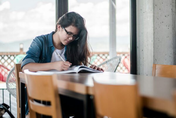 High school student staying organized while studying